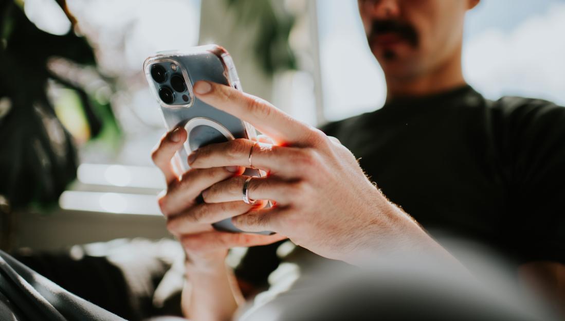 Close-up of a man using a smart phone