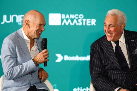 Lawrence Stroll and Adrian Newey at a press conference.