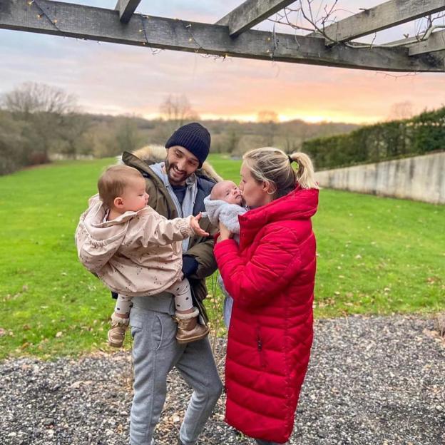 Tom Parker with his wife Kelsey and their two young children.