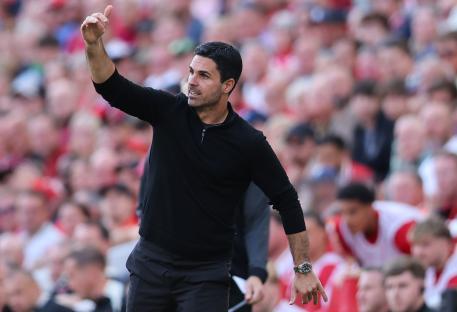 Mikel Arteta, Arsenal manager, gesturing on the touchline.