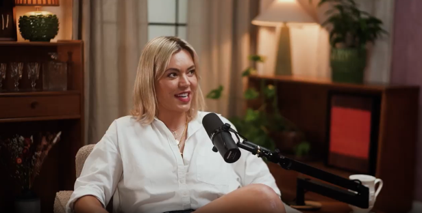 Screenshot of a woman being interviewed on a podcast.