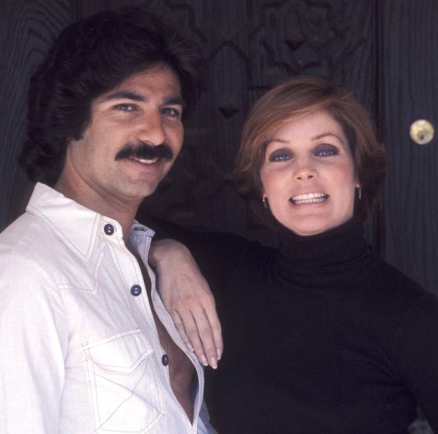 Priscilla Presley and Robert Kardashian posing at Presley's home in Beverly Hills.