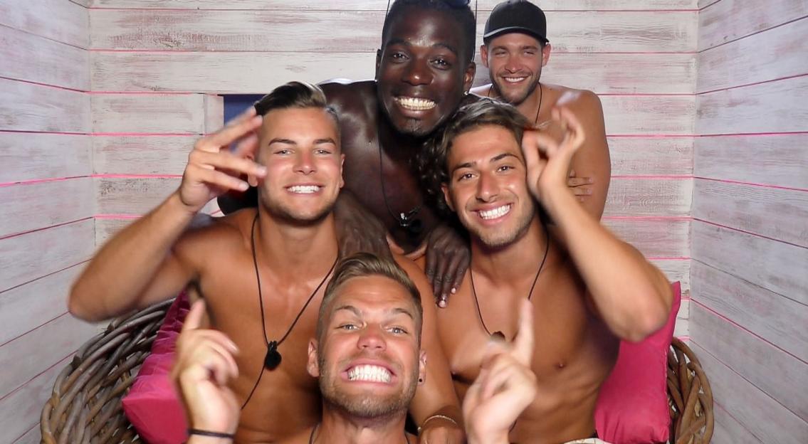 Five men, Dominic Lever, Jonny Mitchell, Kem Cetinay, Marcelle Somerville and Chris Hughes, in the Casa Amor Beach Hut on the set of Love Island.