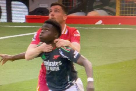 Arsenal fans furious as Bukayo Saka ‘chokeslammed’ by Andy Robertson but VAR fails to intervene