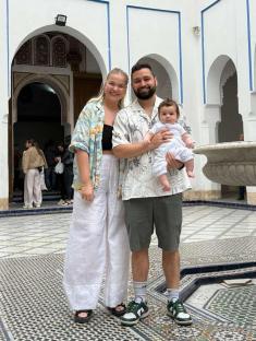 Couple and baby on holiday in Morocco.