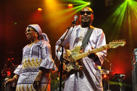 Amadou & Mariam performing on stage.