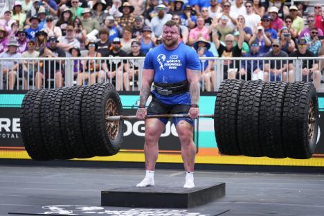 World's Strongest Man Tom Stoltman lifting tires.