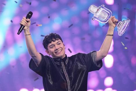 JJ, the Austrian winner of the Eurovision Song Contest, holding the trophy.