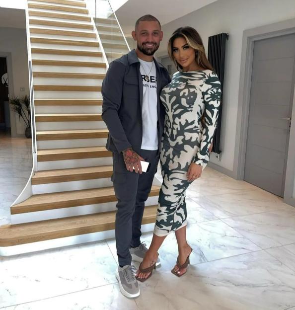 Chloe Ferry and Johnny Wilbo posing together.