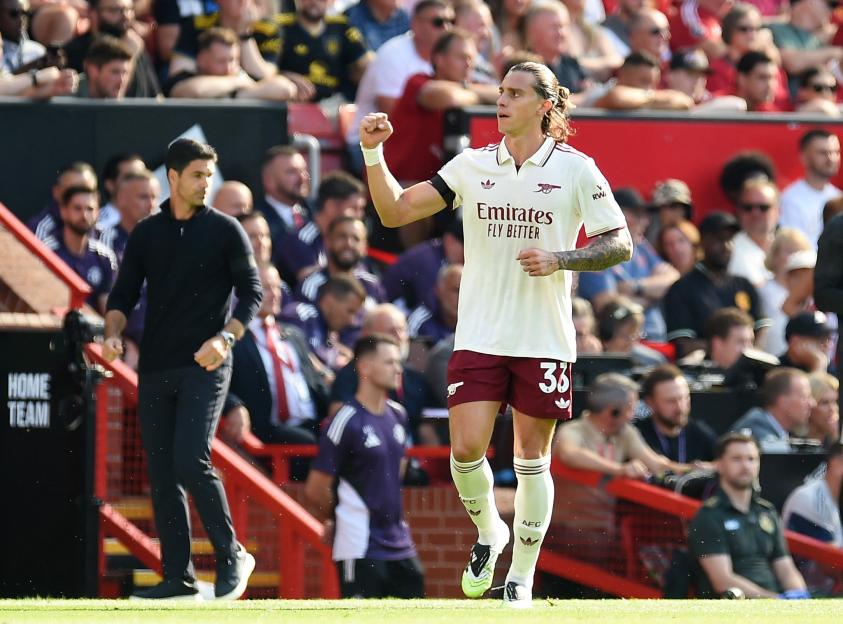 Arsenal's Riccardo Calafiori celebrates scoring a goal.