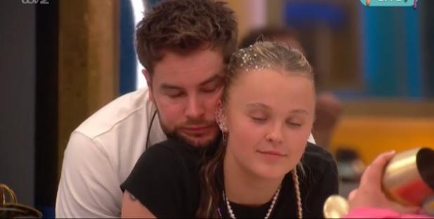 Chris Hughes embracing JoJo Siwa.