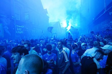 Everton fans outside a stadium.