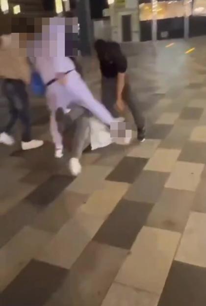 Horrifying moment boy punched, kicked in head and STABBED by yobs as vicious brawl erupts near train station