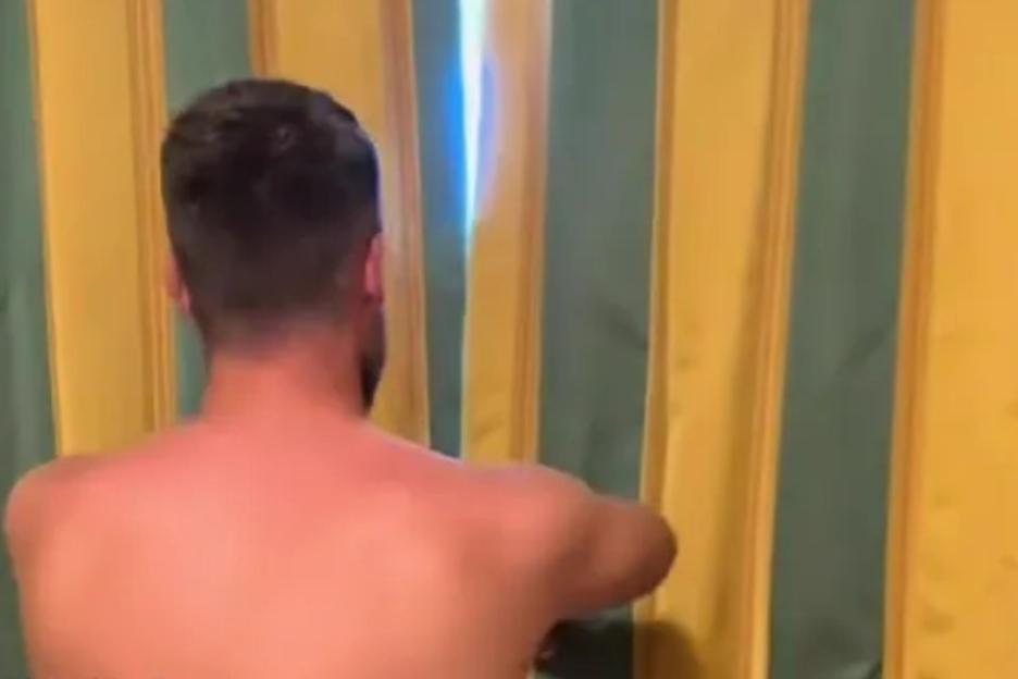 Holidaymaker expects breathtaking view from his hotel window… but viewers in stitches when he pulls back curtain