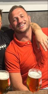 A British father-of-three has died after being allegedly being hit with a vodka bottle on a stag do in Prague David 'Dai' Richards, 31, was killed in the Czech capital when he was struck to the back on the head by the bottle on the first night of the stag weekend. The keen footballer from set off from his family home in Mountain Ash, South Wales, at 5am on Friday for the fun weekend away - but was attacked at 10pm in the street. He was put on a life support machine but died in hospital. Pictured here David 'Dai' Richards WALES NEWS SERVICE