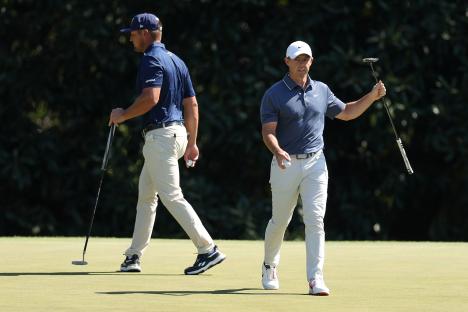 Bryson DeChambeau and Rory McIlroy on a golf course.
