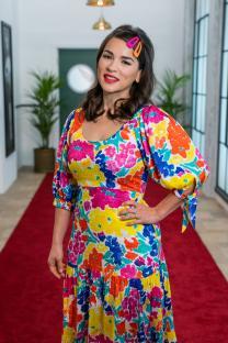 Rachel Khoo in a floral dress.