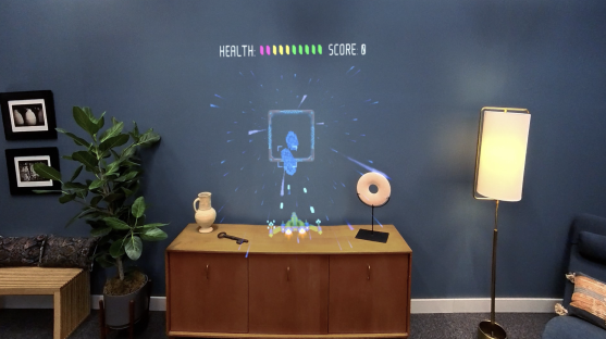 Augmented reality game projected onto a mid-century modern sideboard.