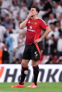 Harry Maguire of Manchester United reacts during a soccer game.