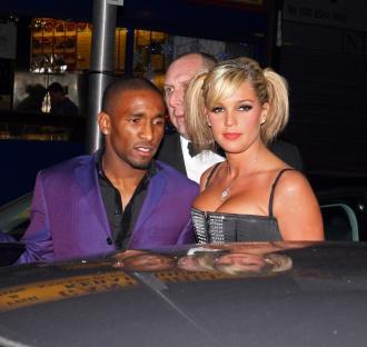 Danielle Lloyd and Jermain Defoe arriving at a party.