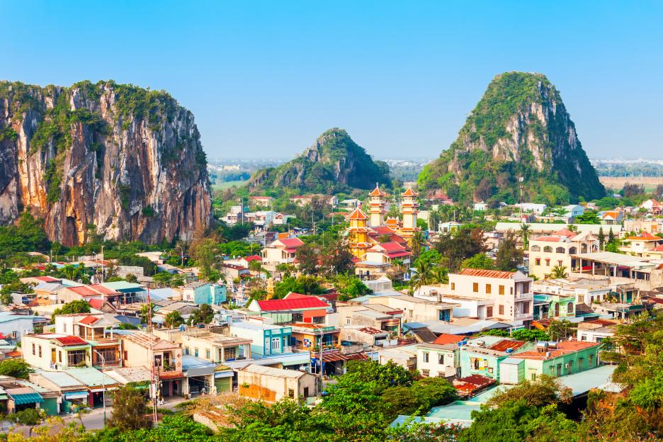 Aerial view of Da Nang Marble Mountains and surrounding town in Vietnam.