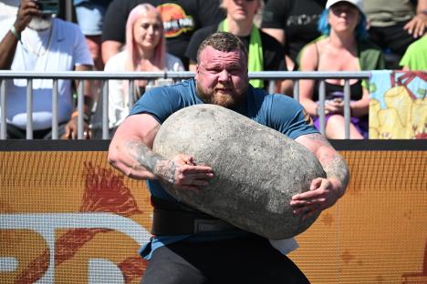 Tom Stoltman competing in the stone medley at the World's Strongest Man competition.