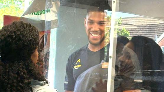 ‘Most humble man I’ve met’ – Anthony Joshua stuns customers at Morrisons as he works behind till