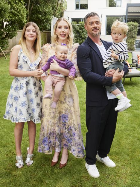 Katherine Ryan with her family in their garden.