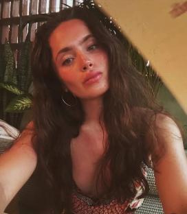 Portrait of Mia Carragher.