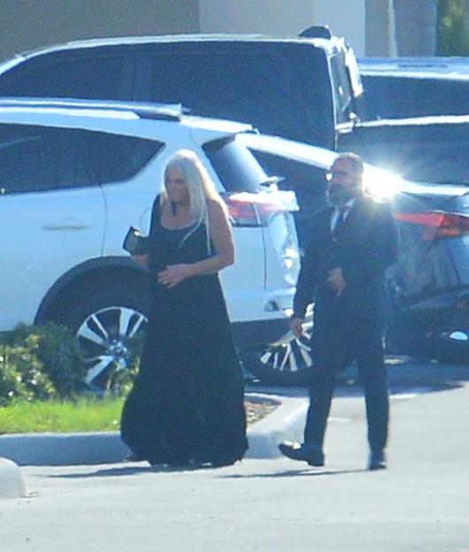 Linda Hogan leaving a memorial service.