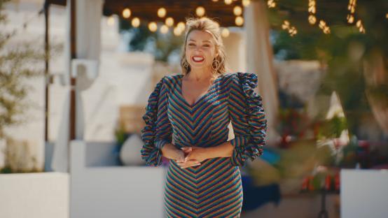 Dannii Minogue in a striped dress.