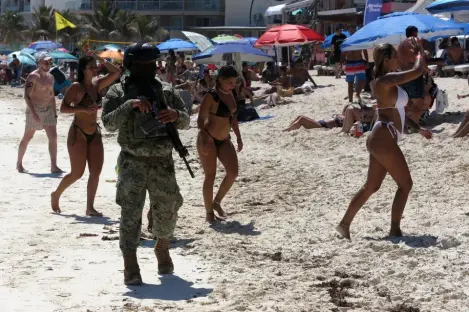 Dark side of Brit hols hotspot where innocent tourists are caught in crossfire between warring cartels & drug kingpins