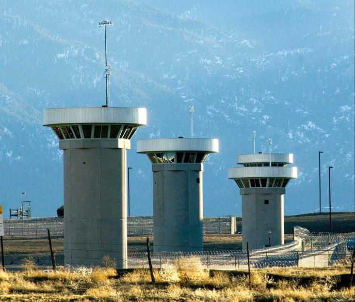 Three guard towers at a maximum-security prison.