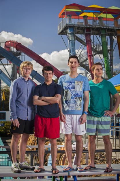 The cast of The Inbetweeners 2 posing at a water park.
