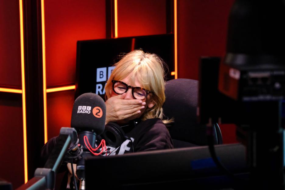 Zoe Ball covering her mouth while presenting her last BBC Radio 2 breakfast show.