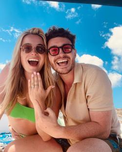 Sian Welby and Jake Beckett announcing their engagement.
