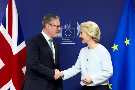 Keir Starmer and Ursula von der Leyen shaking hands at a press conference.