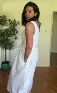 Woman in a white summer dress.