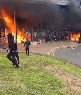 Masked yobs set fire to NI leisure centre ‘used to house locals fleeing riots’ as protests hit Ballyrema for 3rd night