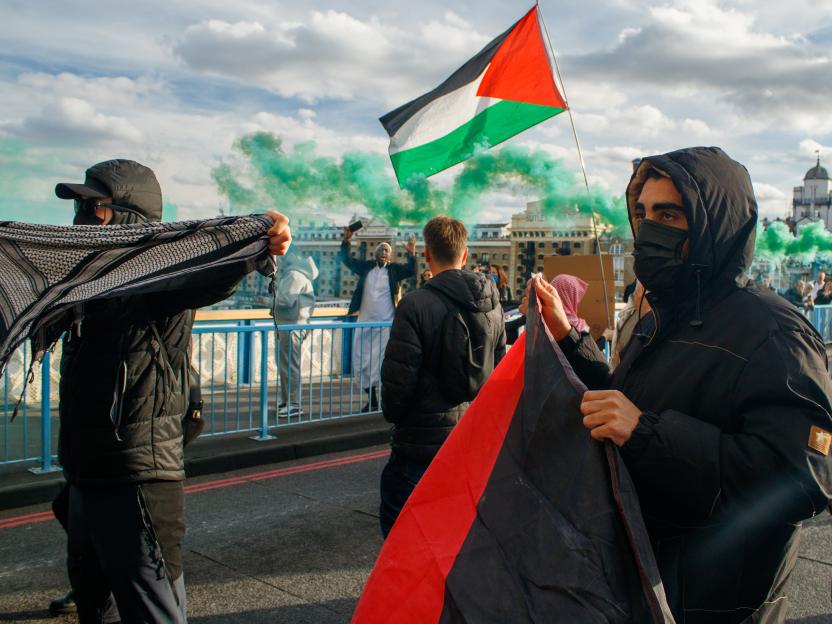 Protesters from Youth Demand and other Palestine groups block Tower Bridge, London, UK.