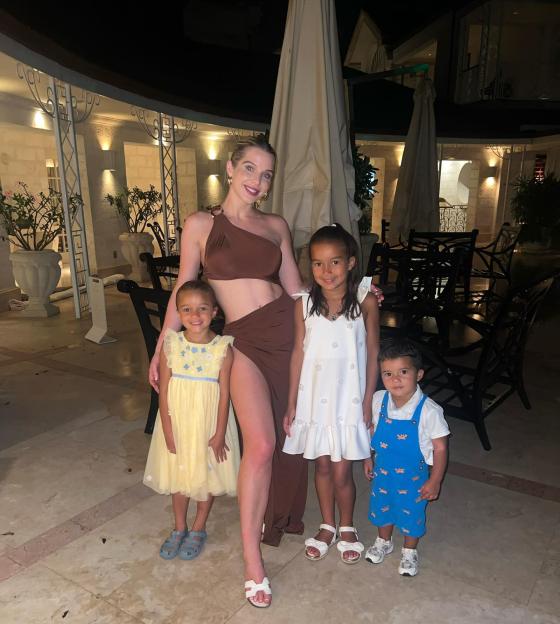 Helen Flanagan with her three children on holiday.