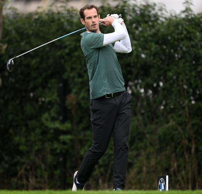 Man golfing.