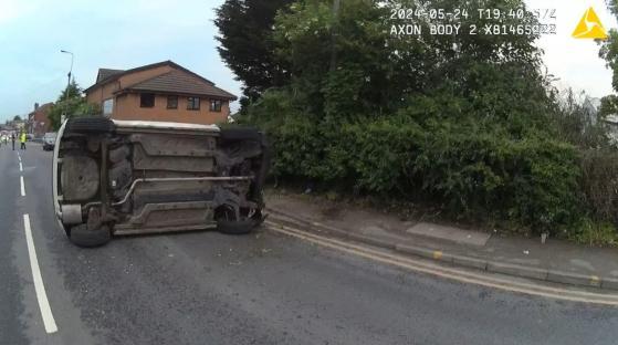 Upside-down car on the road after an accident.