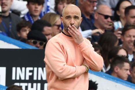 Chelsea manager Enzo Maresca looking dejected during a Premier League match.