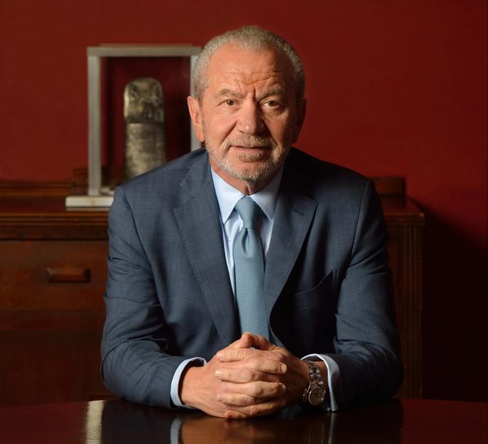 Lord Alan Sugar posing for a portrait.