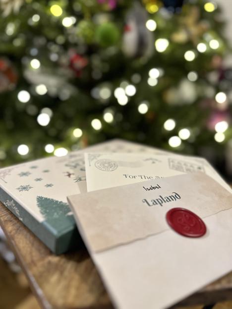 Kids discovering letters from Santa