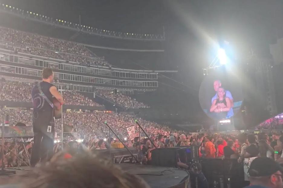 Painful footage shows Chris Martin’s cringing reaction at CEO caught cuddling HR chief at Coldplay gig