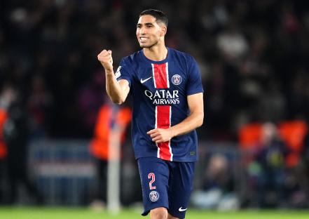 Achraf Hakimi of Paris Saint-Germain celebrating a goal.