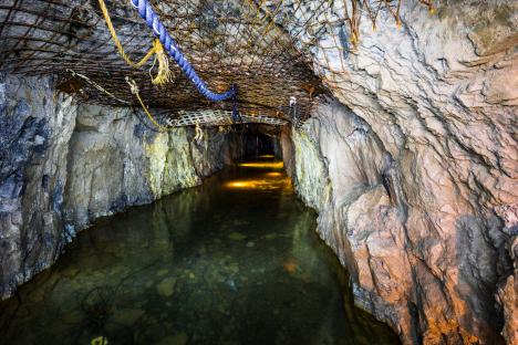 Interior view of a flooded mine tunnel in OsÃ³wka, Poland.