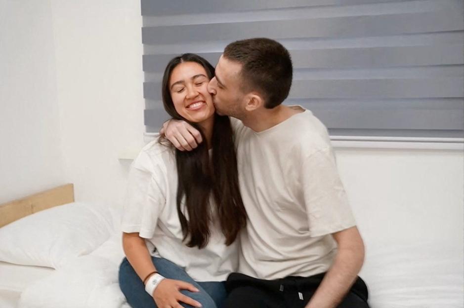 Released Israeli hostage Avinatan Or kisses his girlfriend, Noa Argamani, after his release as part of a prisoner-hostage swap.